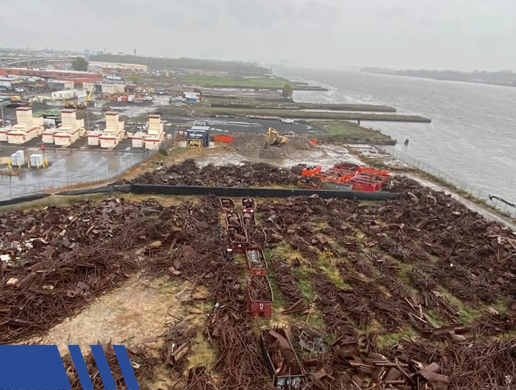 ariel image of demo project and tehre own dumpsters Safe Handling of Full Building Removal